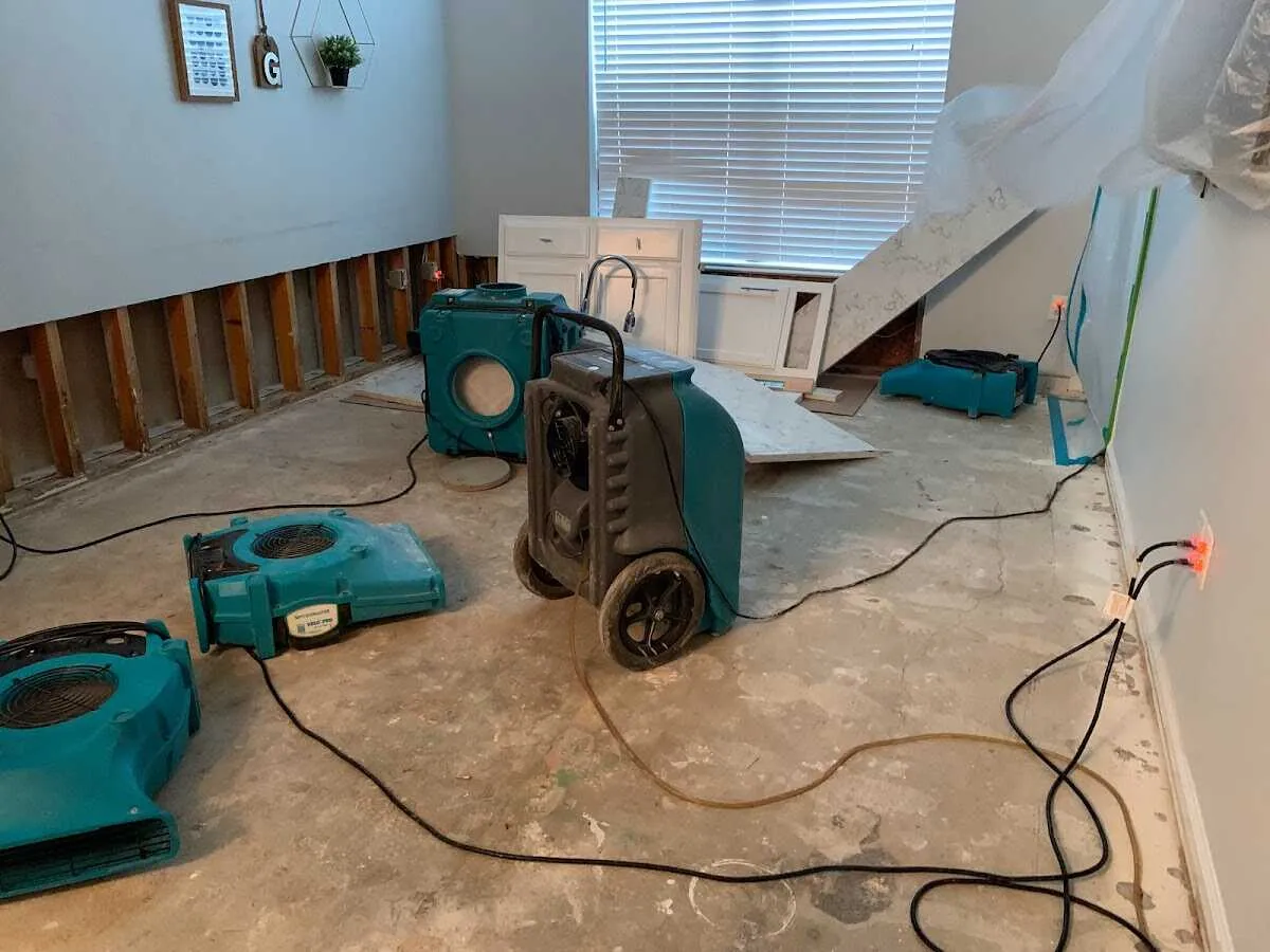 Dehumidifier in flood-cut room for Water Damage Restoration in Carthage